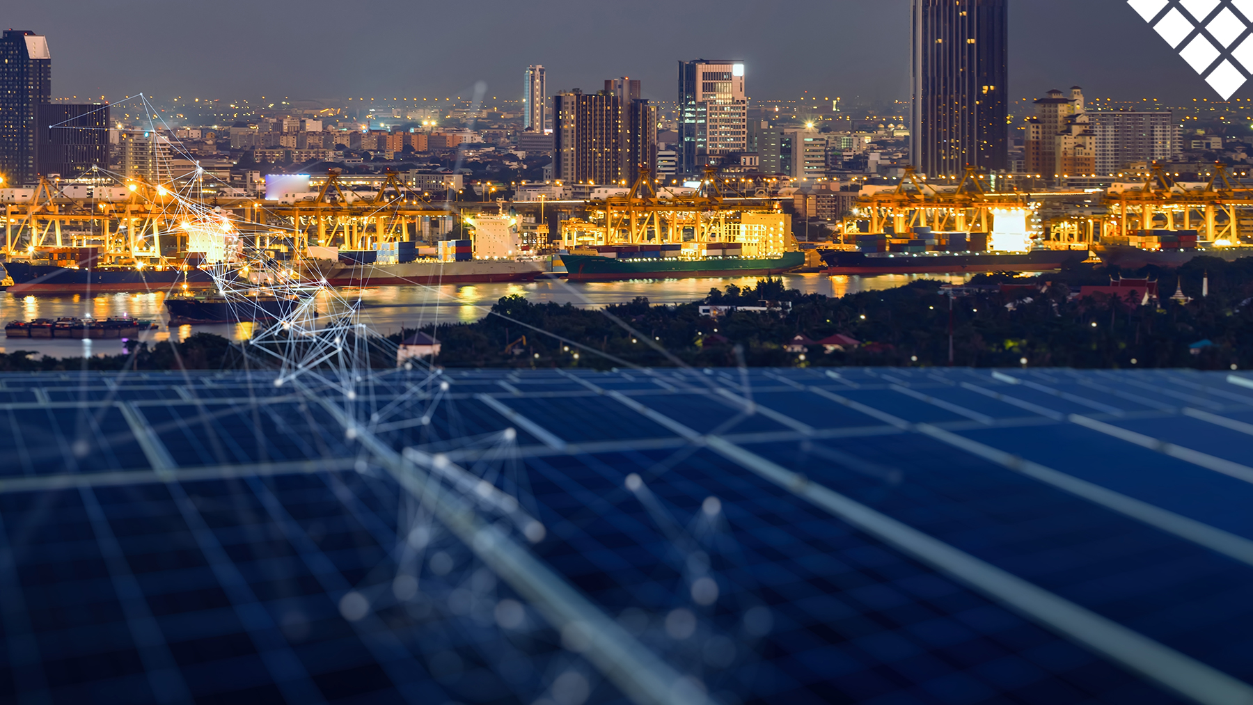 Solar Panels in the foreground with lit up city at night and tech like lines over top