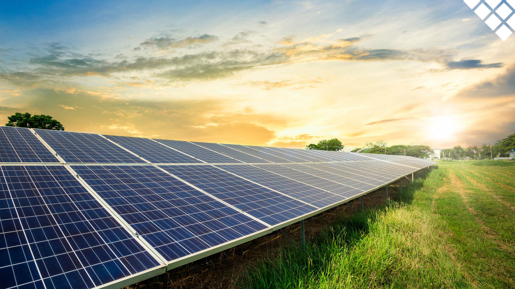 Solar panel cell on dramatic sunset sky background